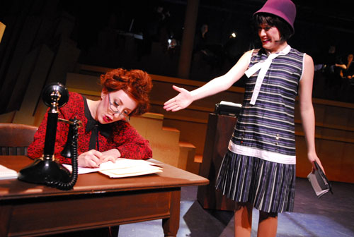 Pictured (l to r): Katie Kester (Miss Flannery) and Alison Luff (Millie) in The Gallery Players production of <cite>Thoroughly Modern Millie</cite>.  Photo by Jen Maufrais Kelly.